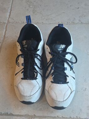 New Balance Men’s White and Black Athletic Sneakers with Blue Accents